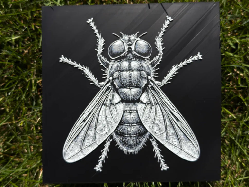 Husflue – 3D-printet HueForge-bilde flatt på underlag